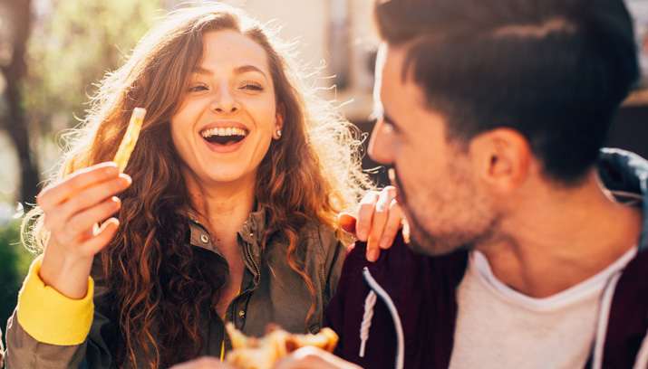 Friends eating fries
